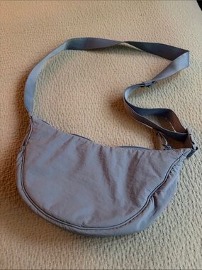 Uniqlo round shoulder bag in blue